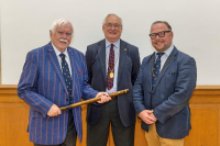 James (Hamish) Steele receives his 25 Years Service baton from Depute Provost Andrew Parrot, watched by Moderator David B Cuthbert Jnr. 5 September 2022 (Photo by kind permission of Richard Wilkins)